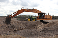 Photo of excavator in federal excess property program